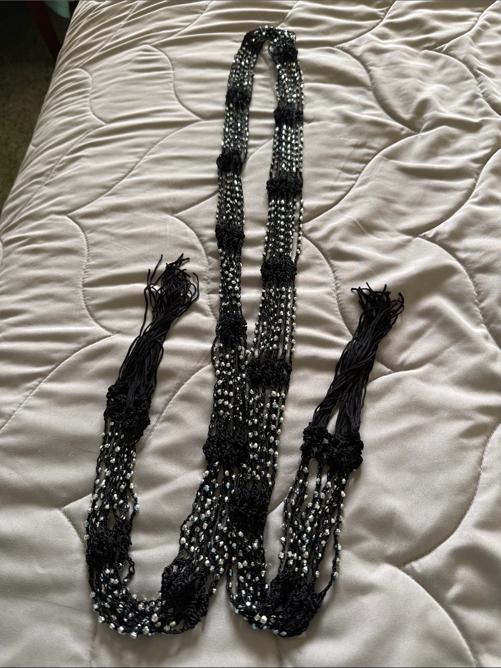Multi-Strand Black Beaded Necklace with Metallic Accents